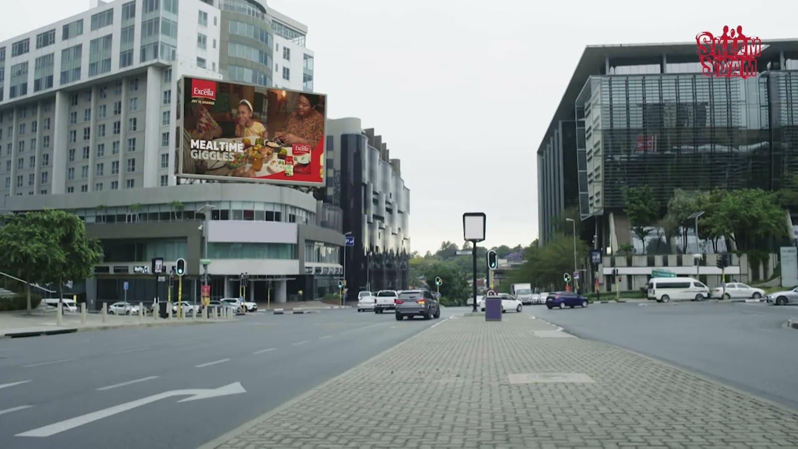 An Excella placement written into a city scene in Inimba